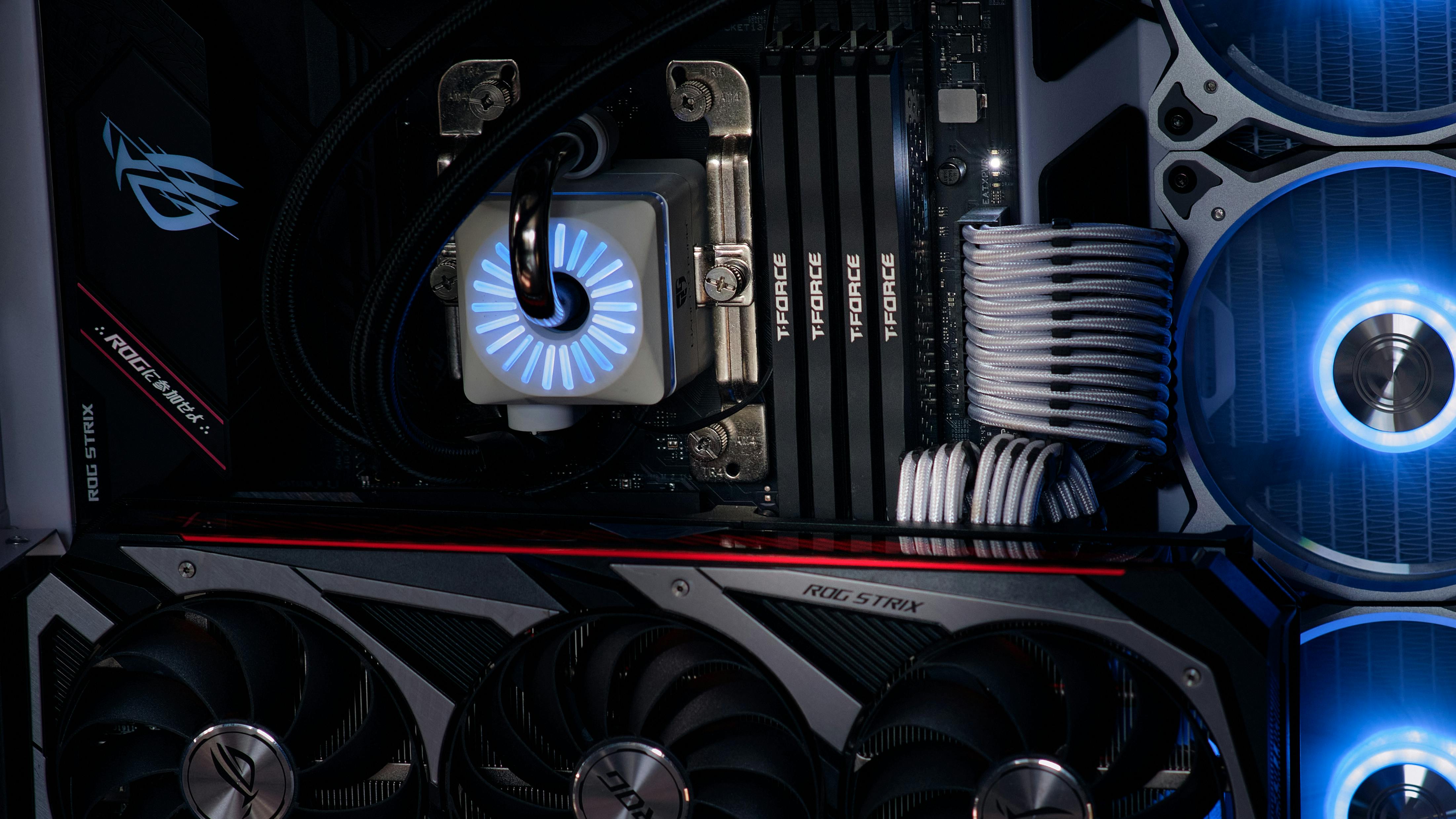 Detailed view of gaming PC components showcasing cooling systems and RAM modules.